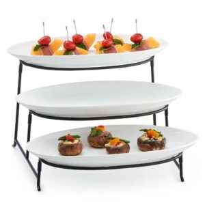 3-Tier Plate Server Set food network This three-tier serving platter keeps every event elegant. Makes a great wedding or housewarming gift. PRODUCT FEATURES Platters hold appetizers, desserts and more. Sleek lines add a contemporary touch to any table. Three-tier metal serving rack lends eye-catching appeal. Collapsible design promises space-saving storage. WHAT'S INCLUDED Three platters: 15 1/4"L x 8"W (each) Serving rack: 9"H x 13"W PRODUCT CONSTRUCTION & CARE Porcelain/wrought iron Platters: dishwasher & microwave safe Rack: wipe clean