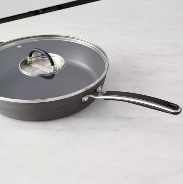 Hard Anodized Cookware 10-pc. Hard-Anodized Nonstick Cookware Set Food Network™ Hard Anodized Cookware,With a neat, easy-to-store stacking design, this 10-piece cookware set is a must-have in every busy kitchen. PRODUCT FEATURES Nonstick cookware makes cooking and cleanup a breeze. Cookware stacks neatly for organized storage WHAT'S INCLUDED 1.5-qt. saucepan with lid 3-qt. saucepan with lid 6-qt. stockpot with lid 3-qt. saute pan with lid 8-in. skillet 10-in. skillet PRODUCT CONSTRUCTION & CARE Aluminum Dishwasher safe, hand wash recommended Oven safe to 350°F Safe for use with nylon, silicone and wood utensils. Not safe for use with metal utensils.
