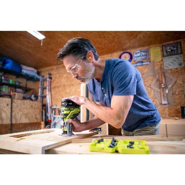 Ryobi ONE+ 18V Lithium-Ion 4.0 Ah Compact Battery (2-Pack) and Charger Kit with FREE Cordless ONE+ Compact Router RYOBI introduces the 18V ONE+ Lithium-Ion 4.0 Ah Compact Battery (2-Pack) and Charger Kit with FREE Cordless ONE+ Compact Router. This RYOBI 18V ONE+ Lithium-Ion 4.0 Ah Battery (2-Pack) and Charger Kit provides up to 3X more runtime compared to standard 18V lithium-ion batteries. These batteries are compatible with over 260 18V ONE+ tools to power through all types of projects. Built with professional grade lithium-ion cells these batteries provide fade free, cord-like power. They are engineered to perform in extreme weather temperatures and are engineered to be impact resistant. They also feature an integrated LED fuel gauge for charge monitoring. The included charger is compatible with all RYOBI 18V ONE+ Lithium-Ion Batteries. This Trim Router allows the user to create the perfect edge with the correct router bit and optional woodworking base. With 29,000 RPM, you can trim quickly and efficiently. Best of all, it’s a part of the RYOBI ONE+ System of over 260 Cordless Tools that all work on the same battery. Backed by the RYOBI 3-Year Manufacturer’s Warranty, this kit includes two 18V ONE+ 4.0 Ah Lithium-Ion Batteries, an 18V Charger, a Fixed Base Trim Router, a collet wrench, and an operator's manual. Batteries: Up to 3X more runtime Batteries: Integrated LED fuel gauge to monitor remaining runtime Batteries: Delivers fade-free power in extreme weather conditions Batteries: Robust construction to protect against impact Batteries: Lithium-ion chemical composition resists drainage when idle Batteries: Easily snaps into place and detaches with quick-release buttons Batteries: Recharge on any 18V ONE+ charger Charger: Compatible with all RYOBI 18V ONE+ Lithium-Ion Batteries Cordless Fixed Base Trim Router: Features micro-adjusting to dial into specific settings Cordless Fixed Base Trim Router: Aluminum base offers stability and accuracy Cordless Fixed Base Trim Router: Sturdy battery base for easy and stable bit changes Cordless Fixed Base Trim Router: Adjustable cut depth to match your desired application Part of the RYOBI ONE+ System of over 260 Cordless Tools 3-year manufacturer's warranty Includes: (2) PBP005 18V ONE+ Lithium-Ion 4.0 Ah Batteries, (1) PCG002 18V Lithium-Ion Charger, (1) P601 Fixed Base Trim Router, (1) collet wrench, and operator's manual