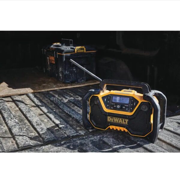 Dewalt 20-Volt MAX Compact Bluetooth Radio (Tool Only) The DEWALT DCR028B 12-Volt/20-Volt MAX Jobsite Bluetooth Radio provides premium sound in the toughest work environments. Its durable roll-cage design withstands drops and impacts, while innovative handle stores and protects radio antenna when not in use. Quad speakers kick out true stereo sound with deep bass. Stream music via Bluetooth from up to 100 ft. or connect through the built-in auxiliary port. AM/FM radio includes 6 customizable presets per band. A convenient USB port charges your mobile devices. DCR028B includes detachable AC power cord or power with DEWALT 12-Volt MAX, 20-Volt MAX or FLEXVOLT batteries (sold separately). Jobsite Bluetooth Radio includes 3-year limited warranty. Dual 3.5 in. woofers and 1 in. tweeters for stereo sound Heavy-duty roll cage with antenna slot for jobsite durability and protection Bluetooth connectivity up to 100 ft. away for music streaming AM/FM radio with 6 presets to customize to your favorite stations USB power port for device charging 3.5 mm auxiliary port to connect external devices Bass reflex port for enhanced low-frequency performance