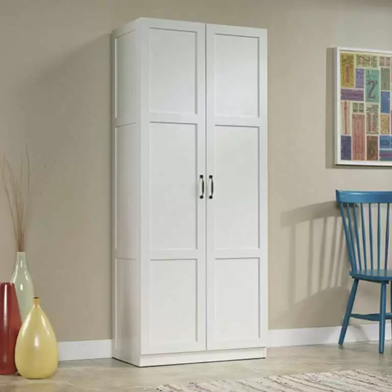 Designer's Image White 71 inches Storage Cabinet Need some extra storage in your life? This storage cabinet features four adjustable shelves and a full-width upper shelf providing ample room to stash clothes, blankets, pantry items, and more. Finished in white and detailed with frame and panel doors and sides, this tall cabinet is ideal for the bedroom, playroom, home office, or anywhere you need a storage solution.